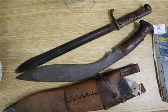 A kukri and a bayonet